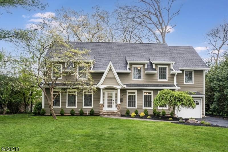 Exceptional curb appeal sets the stage for this picturesque residence, ideally situated on a tree lined street in one of Glen Rock's most sought after neighborhoods.