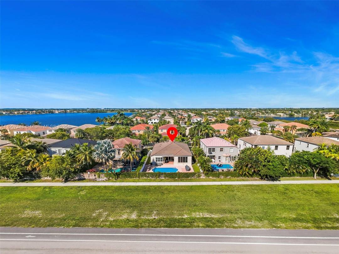 FROM THE STUNNING DOUBLE DOOR ENTRY, 14 FOOT SCULPTED CEILING GRAND POOL VIEW AND MORE.