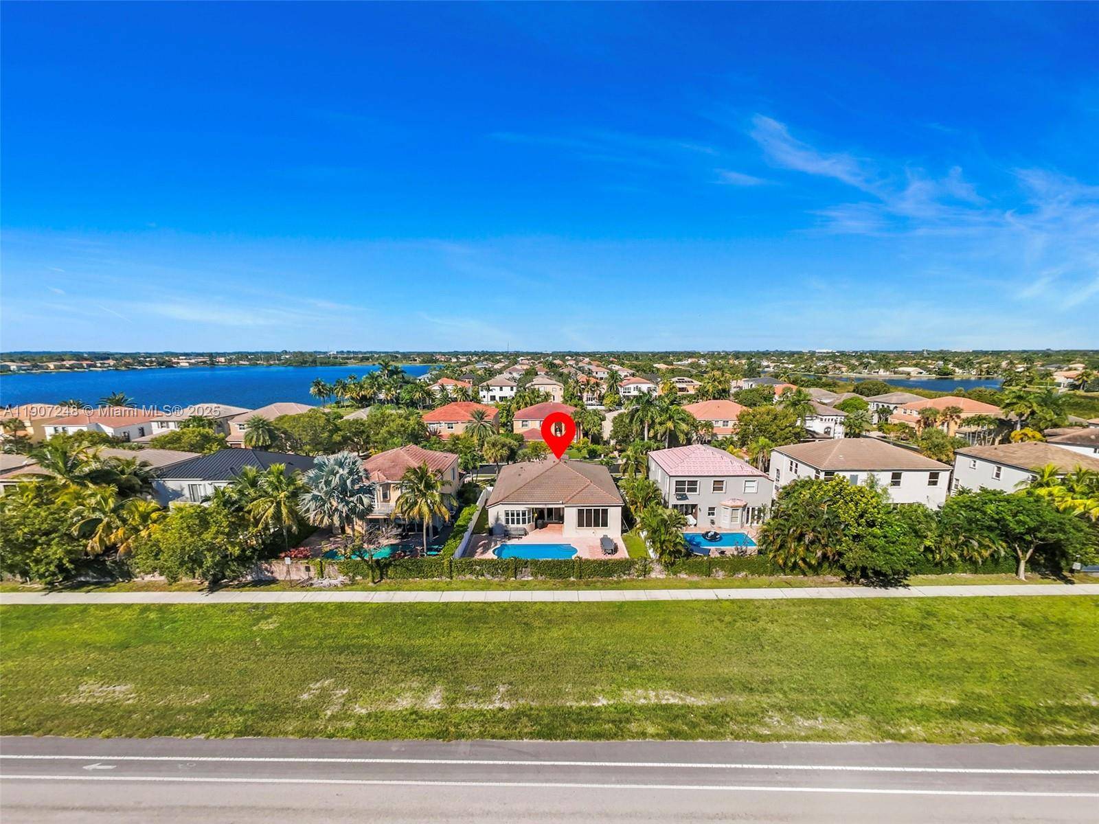 FROM THE STUNNING DOUBLE DOOR ENTRY, 14 FOOT SCULPTED CEILING GRAND POOL VIEW AND MORE.