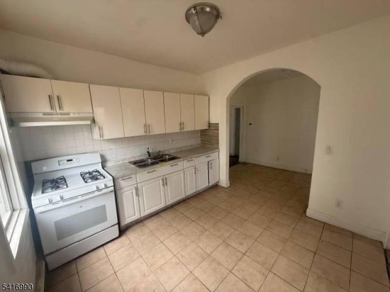 Side by side two family property with separate entrances.