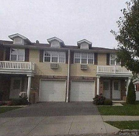Two family house in an upscale, 24 hour gated community known as Country Pointe, located near Alley Pond Park in Queens Village.