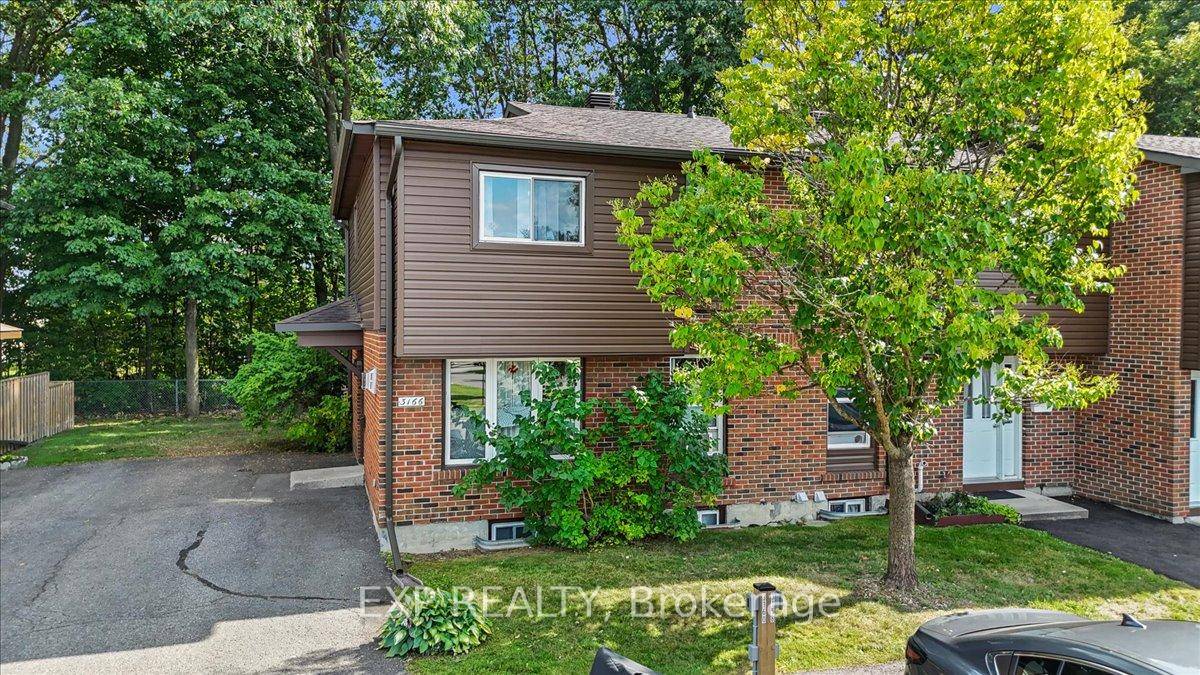 Backing onto greenspace with no rear neighbours, this end unit 3 bedroom, 2 bathroom home is tucked away in an ideal park like location in a peaceful Blossom Park neighbourhood.