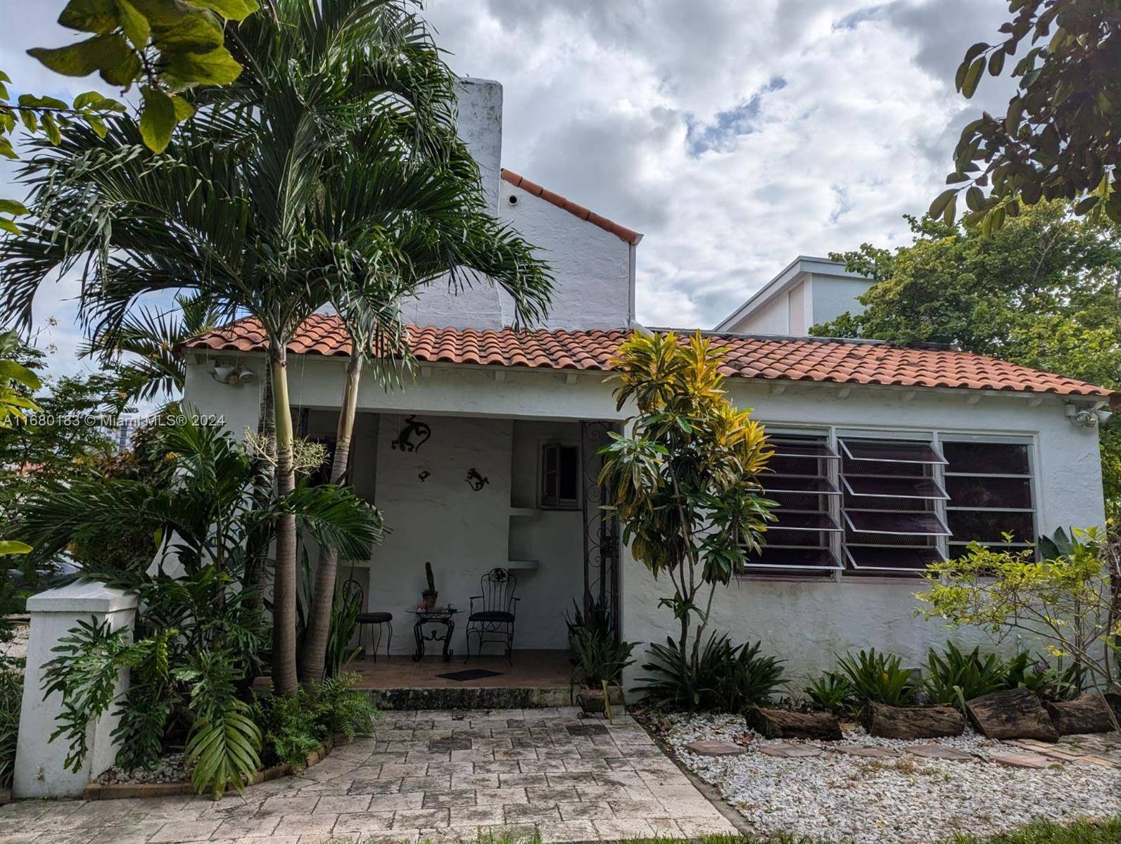 So many possibilities. Spanish Mission style home is also zoned TR4 R which allows for multiple units.