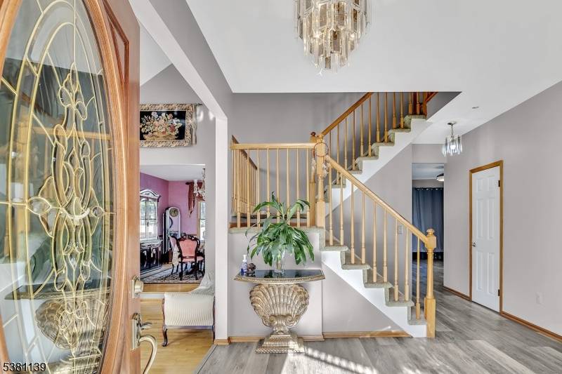 Set in the sought after Pleasantview Farms community, this 4 bedroom, 3.