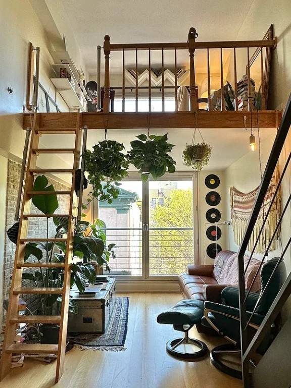 Creatively designed duplex studio with 2 lofted areas, plus a mezzanine level with a walk in closet and 1.