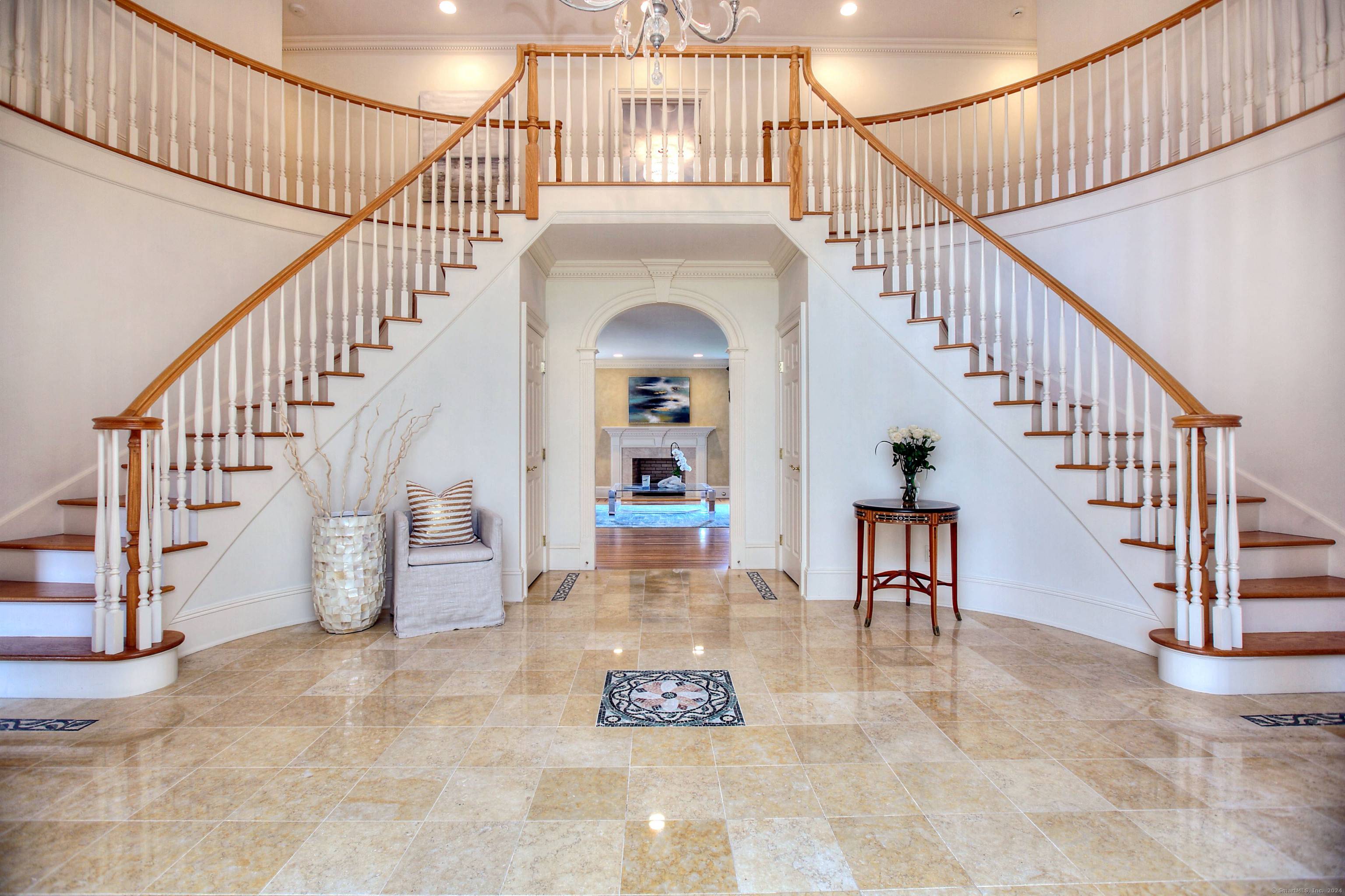 Welcome to Summer Tree Gardens, an extraordinary stately home nestled on over 2 acres of meticulously maintained grounds in the prestigious Greenfield Hill neighborhood of Fairfield, CT.