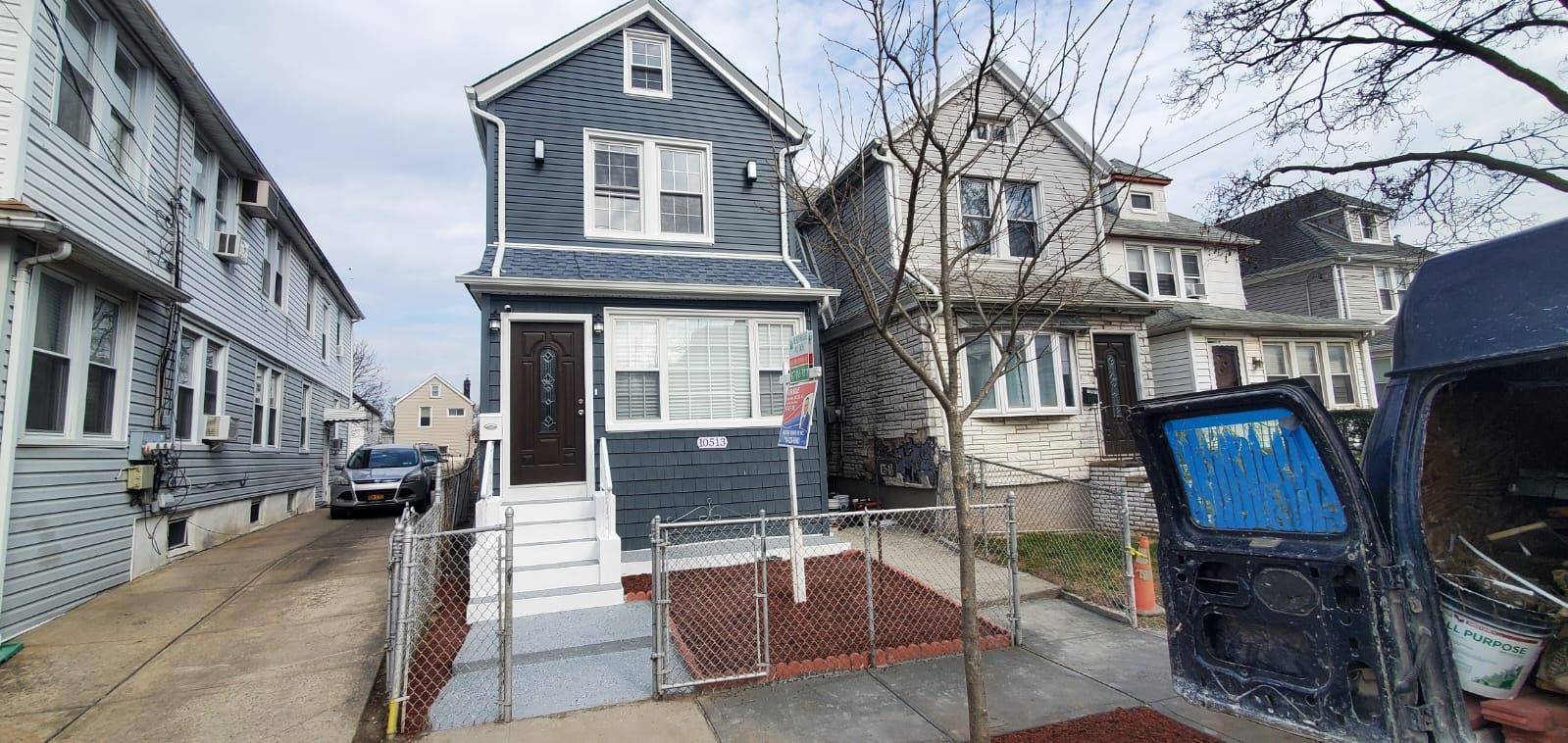 This beautifully renovated single family home offers a perfect blend of modern elegance and comfort.