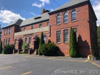 Two story 9, 272 square foot masonry and brick building that was at one time a school, and most recently a restaurant.