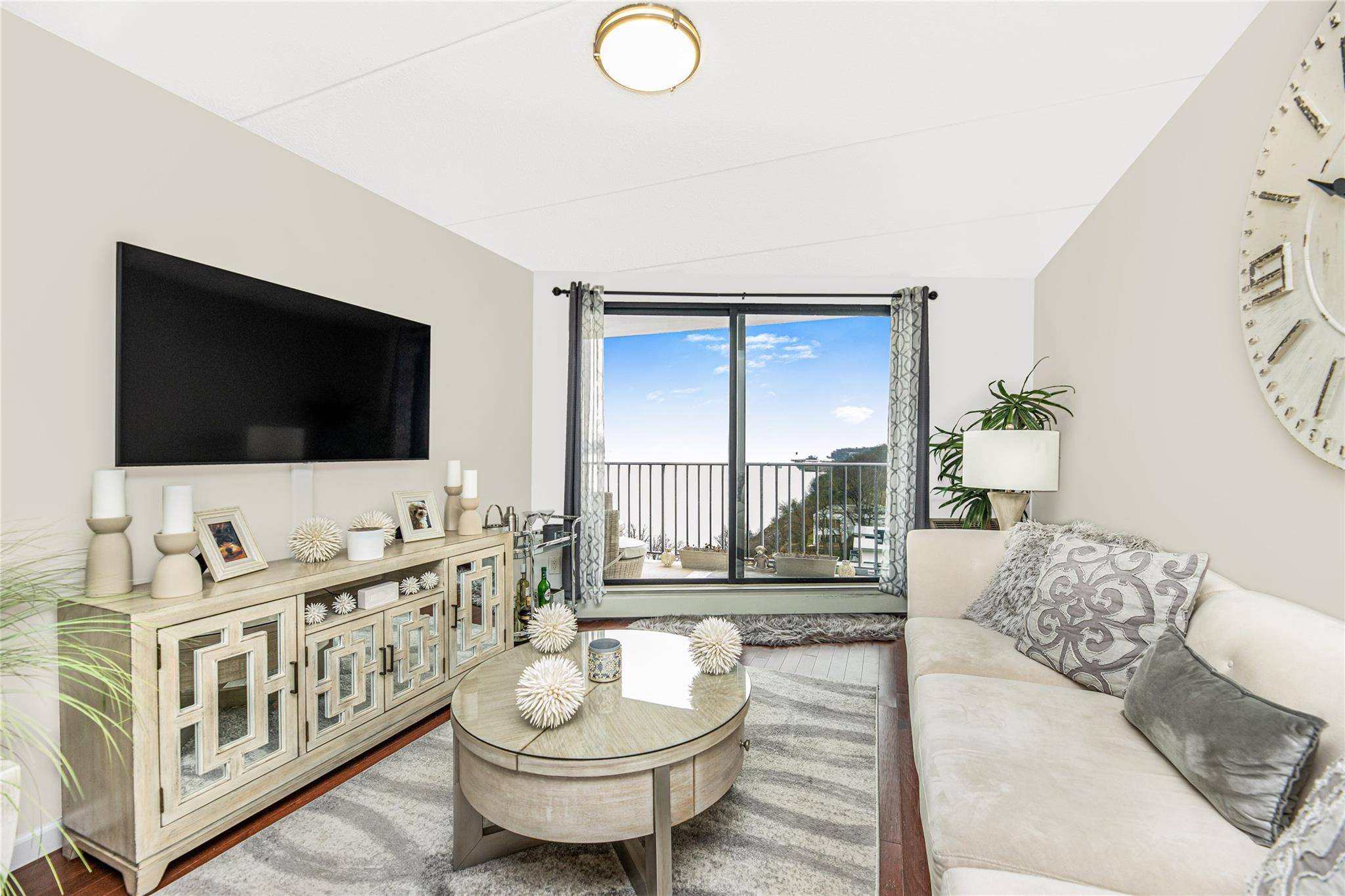 For Sale Sunlit 1 bedroom apartment offering stunning Hudson River views and unobstructed views of the Governor Cuomo Bridge.