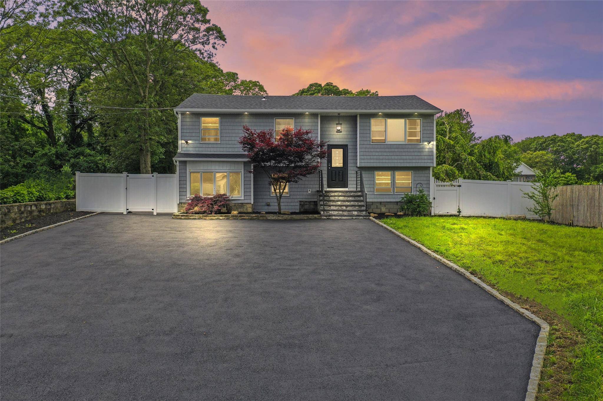 Welcome to 350 Holbrook Road A Beautifully Renovated High Ranch in the Heart of Ronkonkoma !