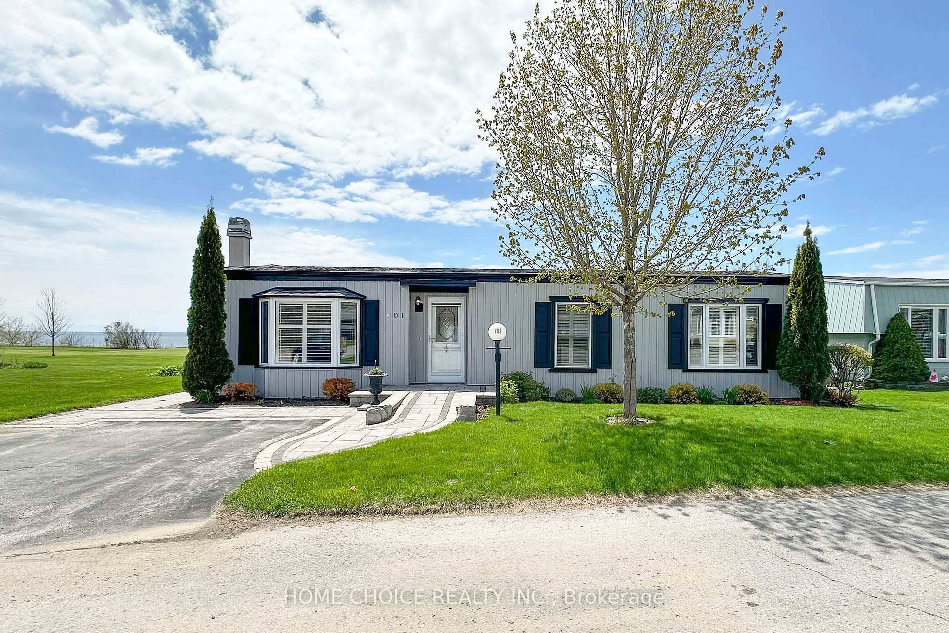 Stunning Waterfront Home with Panoramic Lake Ontario Views.