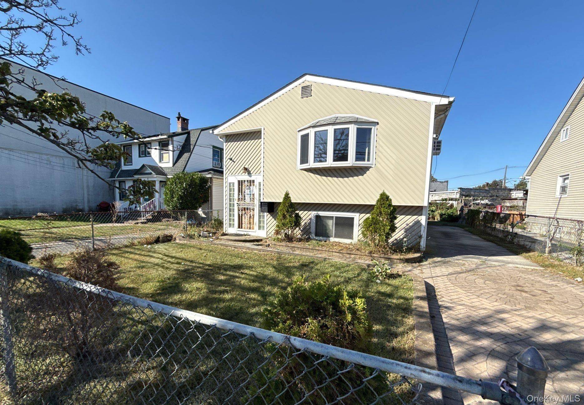 Raised Ranch Style Home. This Home Features 3 Bedrooms, Full Bath and Formal Dining Room.