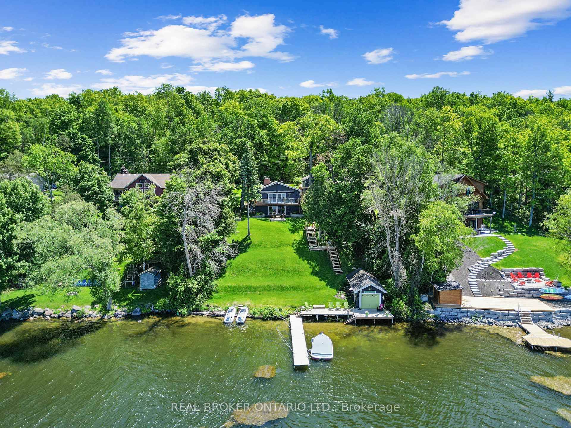 This stunning family residence beautifully combines luxury and serenity, situated upon a hill with views of the Trent River.
