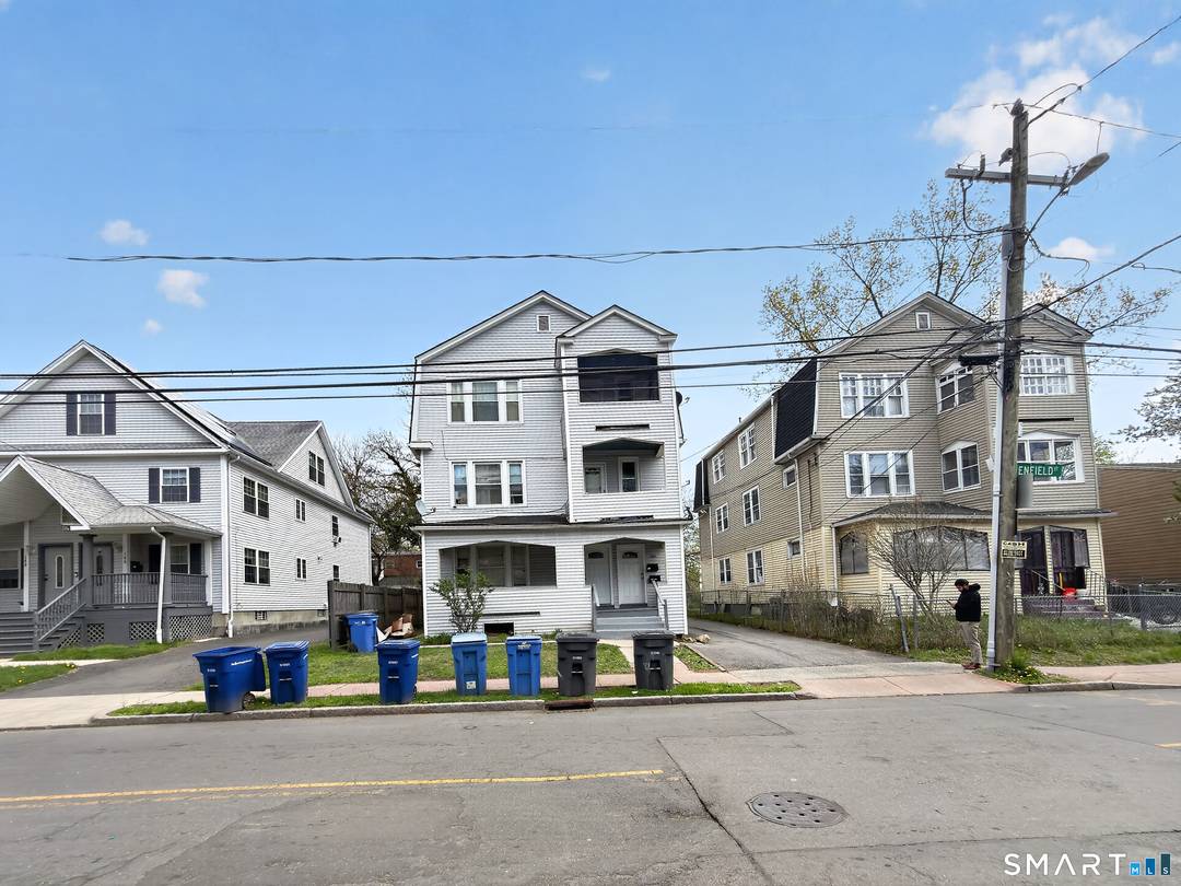 Well maintained three family home located at 140 Enfield Street in Hartford, CT, offering over 3, 800 square feet of living space and just minutes from downtown Hartford.