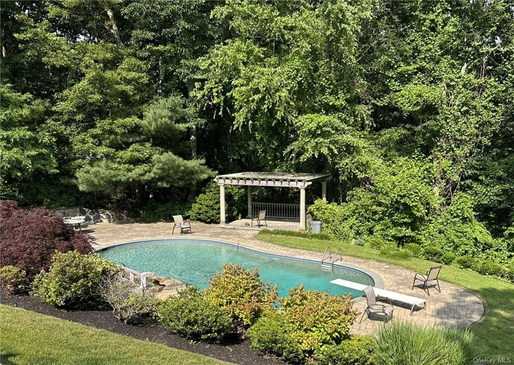 This Winston Woods Atrium Ranch is located in the Half Hollow Hills School district in Dix Hills.