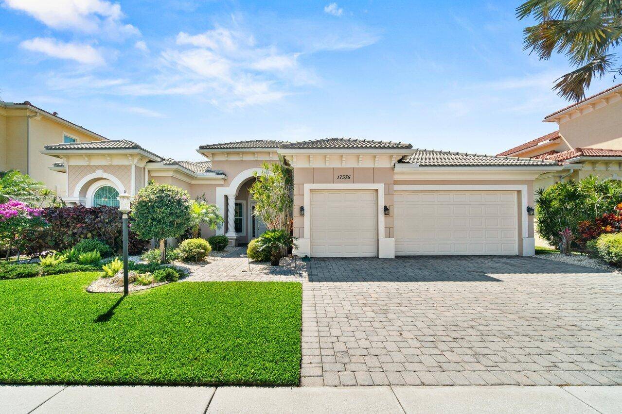 Experience resort style living in this single story home, perfectly nestled on a beautifully landscaped lot with lake views.