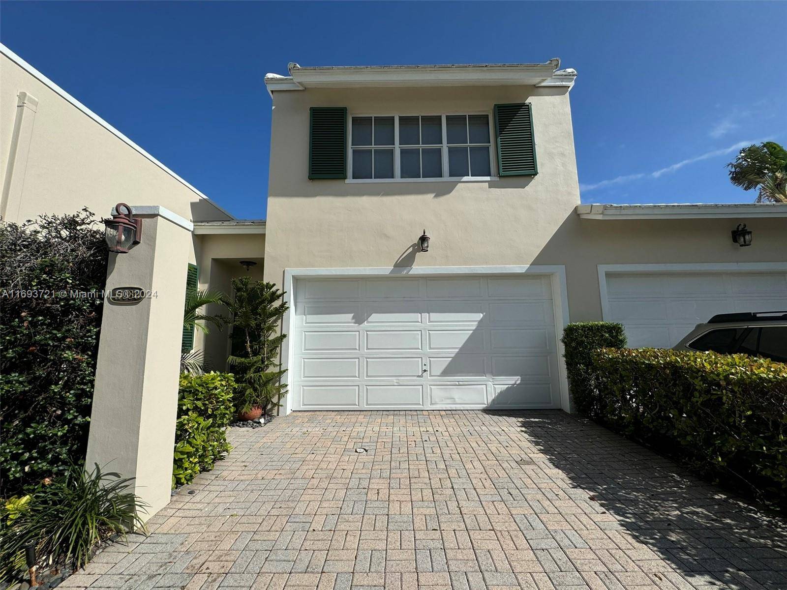 Absolutely enchanting 4 bed 4 bath courtyard townhome with a private pool in the exclusive Boca Golf amp ; Tennis Club !