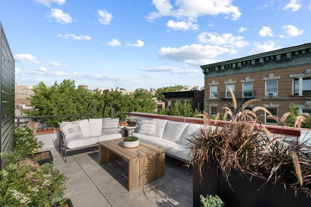 A rare architectural jewel perched above the treetops of Hamilton Heights, this luminous penthouse captivates with extraordinary light, sweeping rooftop views, and an unmistakable sense of character.