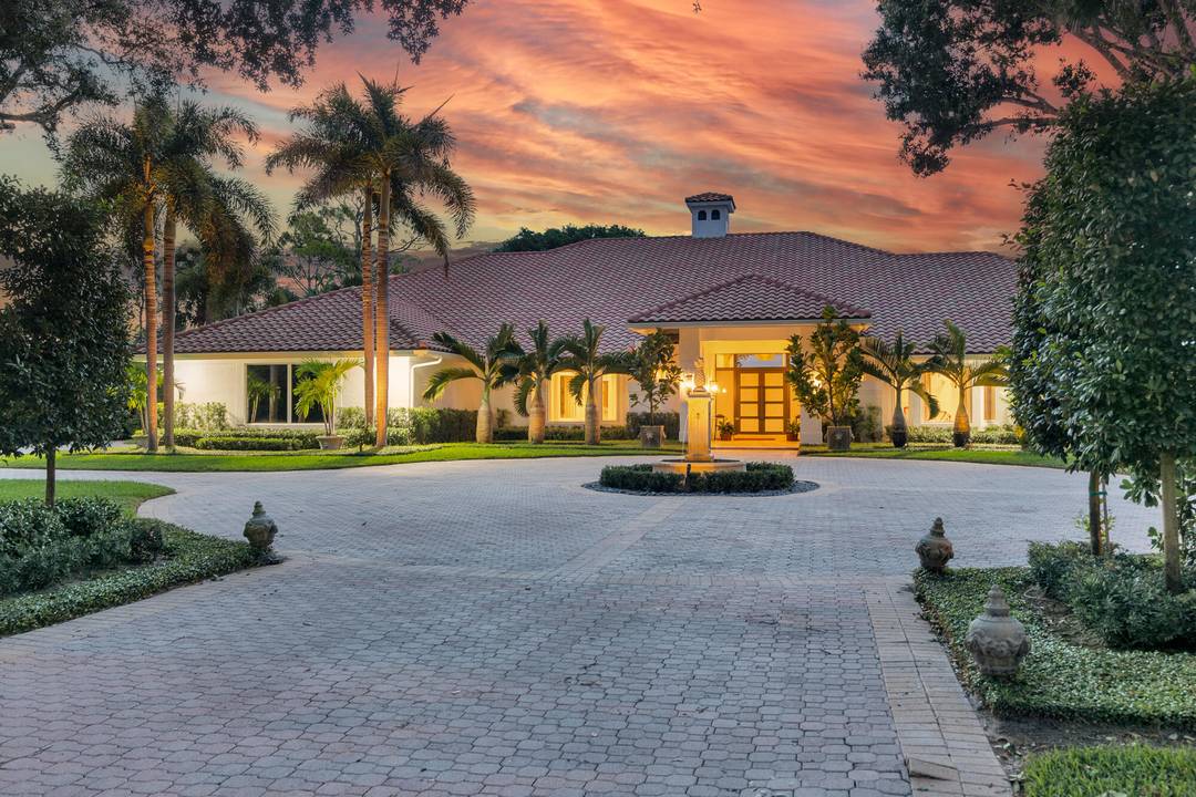 Experience privacy and serenity in this stunning Turn Key estate home in Breakers West.