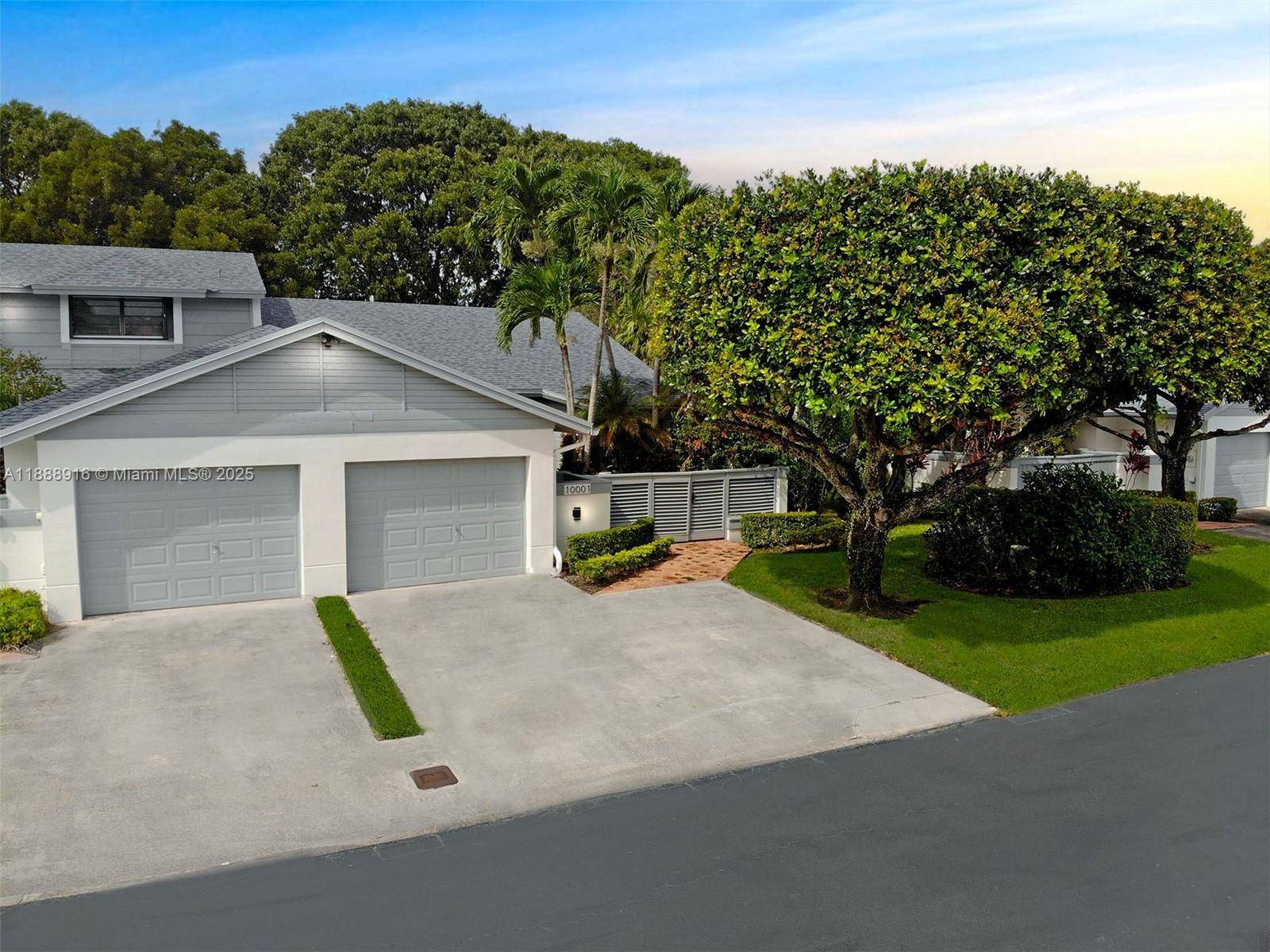 Charming and impeccably maintained 2 bedroom, 2 bath townhouse in the desirable Doral Park Country Club community.