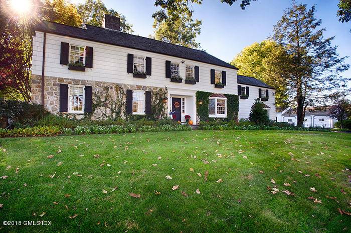 MAGNIFICENT ROUND HILL ESTATE ON 4 BEAUTIFUL ACRES HAS ALL YOU NEED TO ENJOY THE SUMMER.