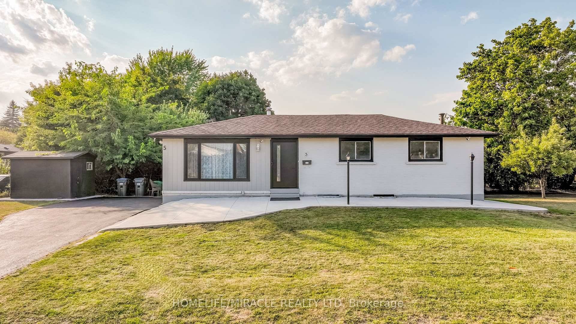 Welcome To This Beautifully Renovated Move In Ready Detached Bungalow home a perfect blend of modern style and functional living.