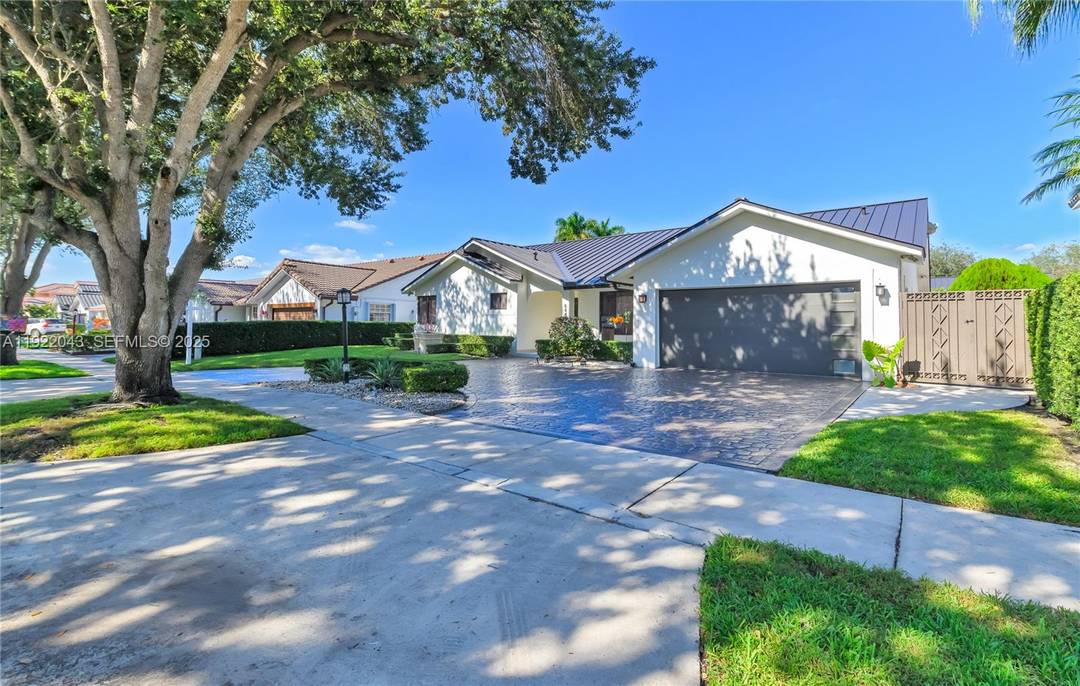 This Miami Lakes home is located in Royal Oaks and has been totally remodeled.