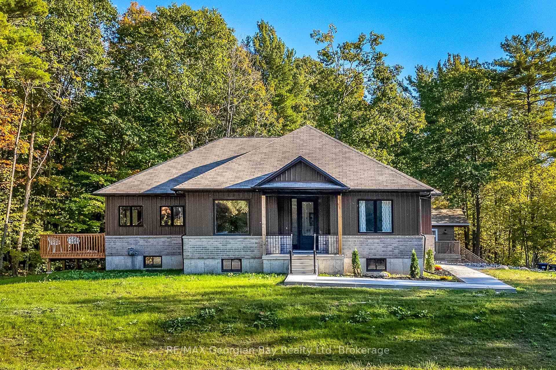 This newish home offers 1700 square feet of finished living space, and is located in Tiny Township's western shoreline area.