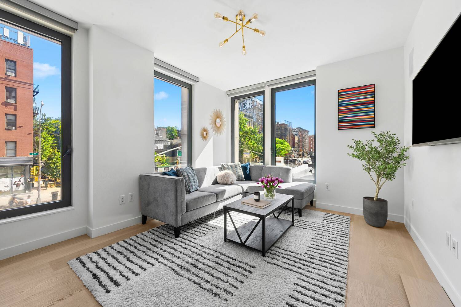 Modern Elegance in a Landmark Boutique Condominium in the East Village Perfectly situated at the nexus of NoHo, the East Village, and the Bowery, this corner two bedroom, two bathroom ...