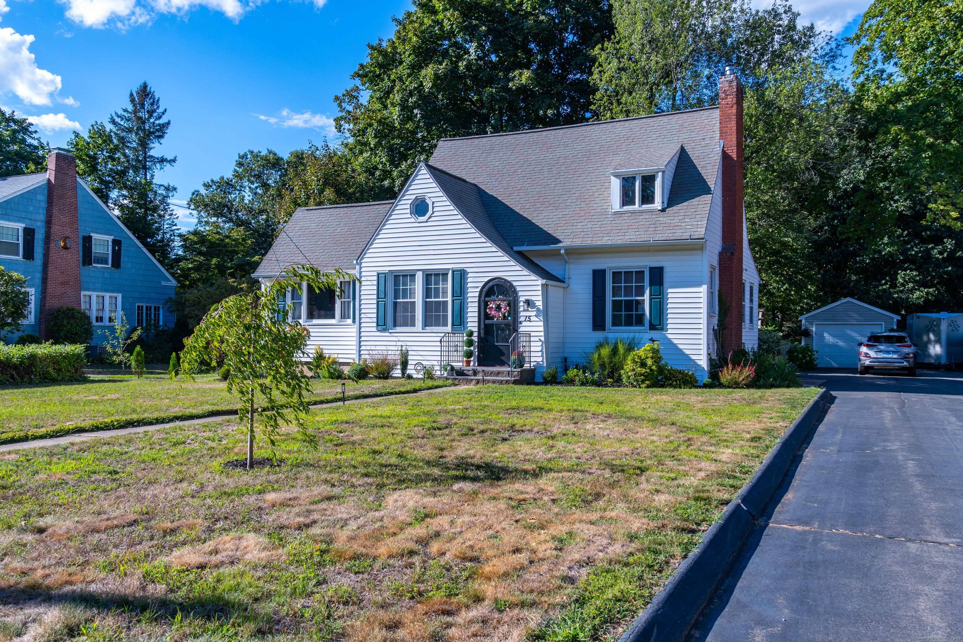 Tucked beneath a sweeping gabled peak, your elegant new home invites you in with timeless character and modern updates.