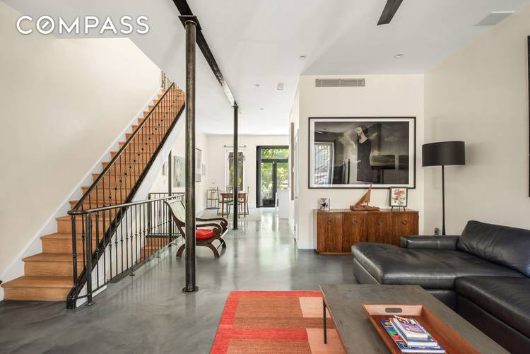 Nestled in the heart of Bedford Stuyvesant, this stunning brownstone offers an exquisite blend of modern industrial style and classic elegance.