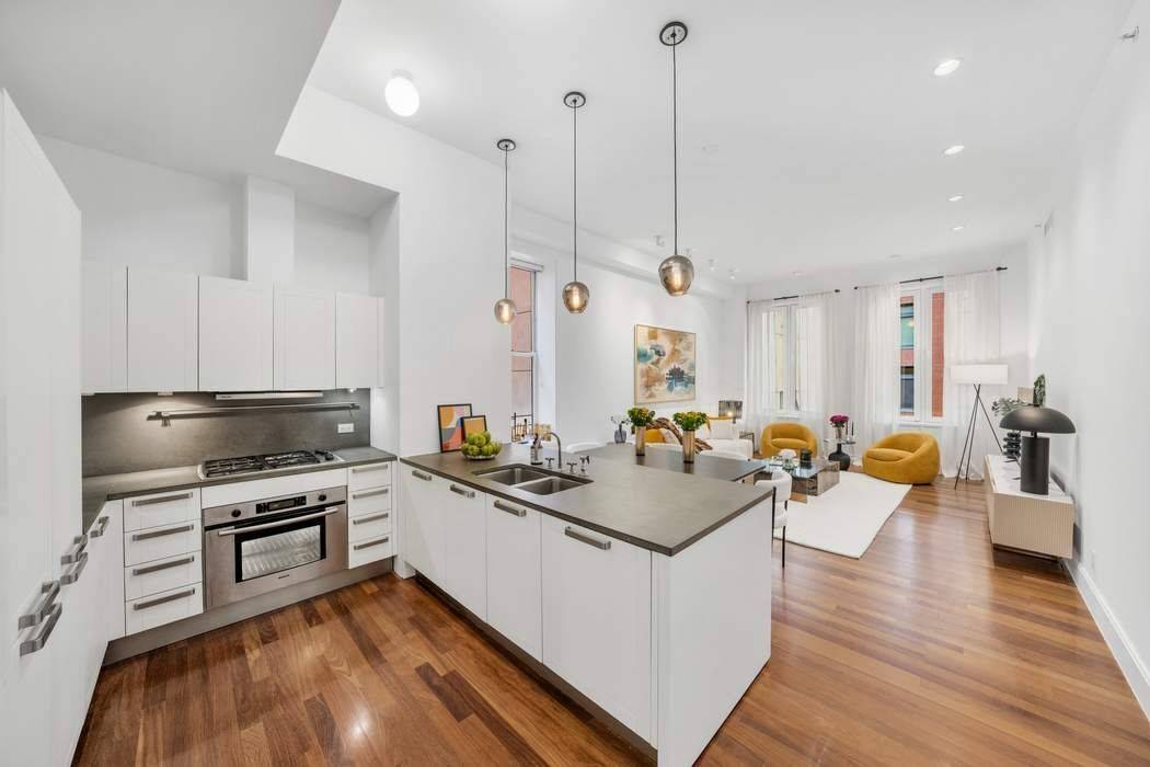 Discover the pinnacle of loft style living in this serene pin drop quiet apartment at esteemed River Lofts Condominiums in Tribeca.