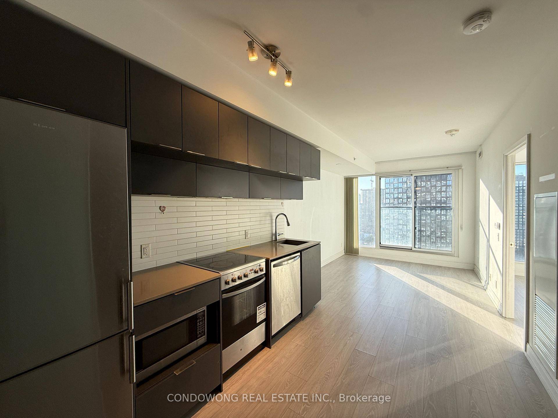 1 Bedroom Den At Centrecourt's Grid Condos With South Facing Balcony View.