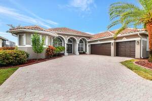 FANTASTIC ONE STORY LAKEFRONT HOME WITH BEAUTIFUL VIEWS FROM JUST ABOUT EVERY MAJOR ROOM.
