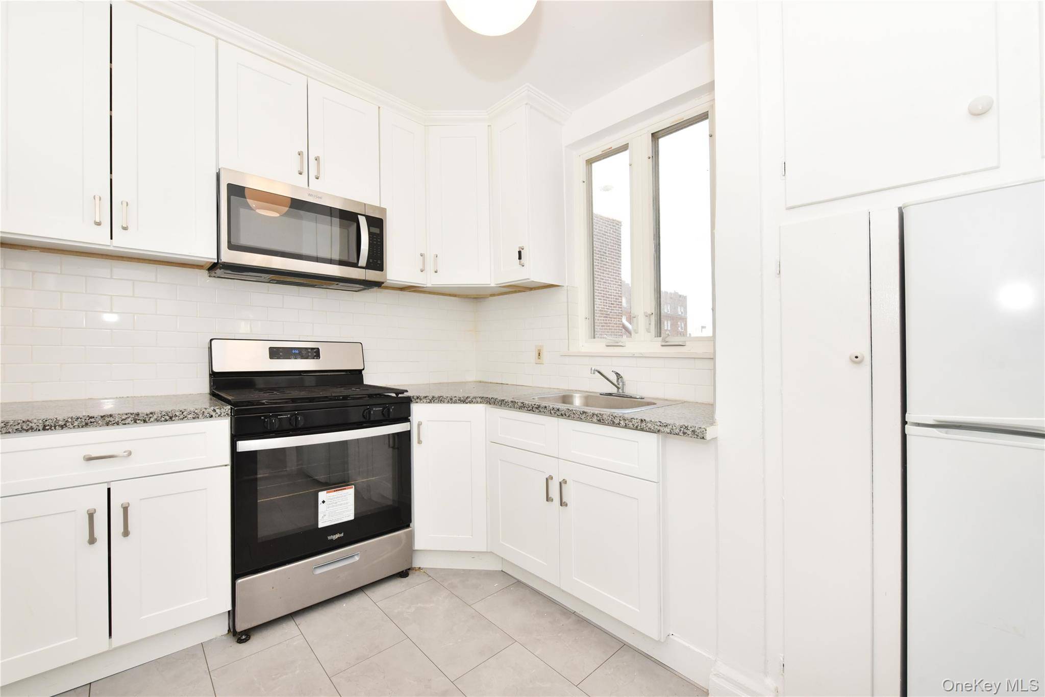 Move In Ready Renovated Condo in the Heart of Rego Park !