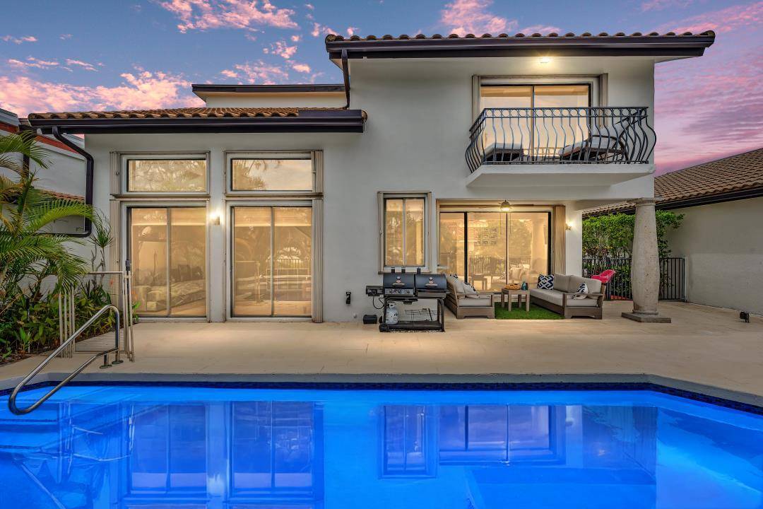Seller to provide buyer a Credit toward a 2 1 interest rate buydown, subject to lender approval Elegant 4 Bedroom Residence in the Coveted Villa Flora at Boca Pointe, beautifully ...
