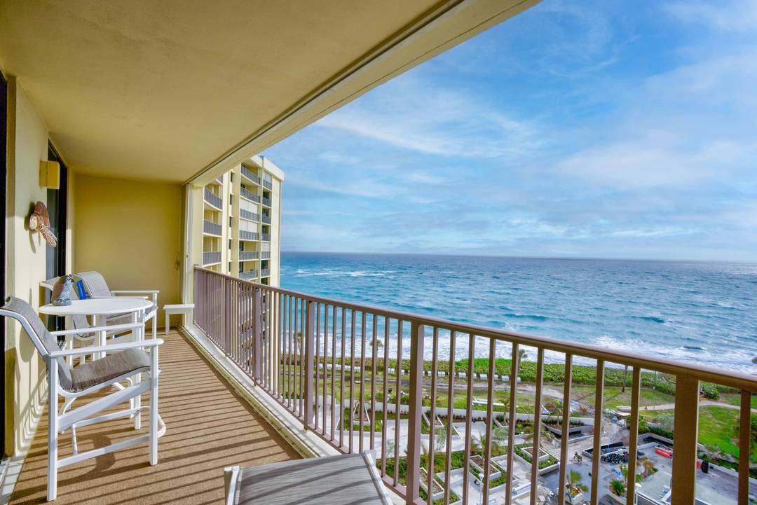 Enjoy stunning blue water ocean views from this 9th floor condo in Ocean Trail Towers, a gated resort style community, located in the heart of all the best Jupiter has ...