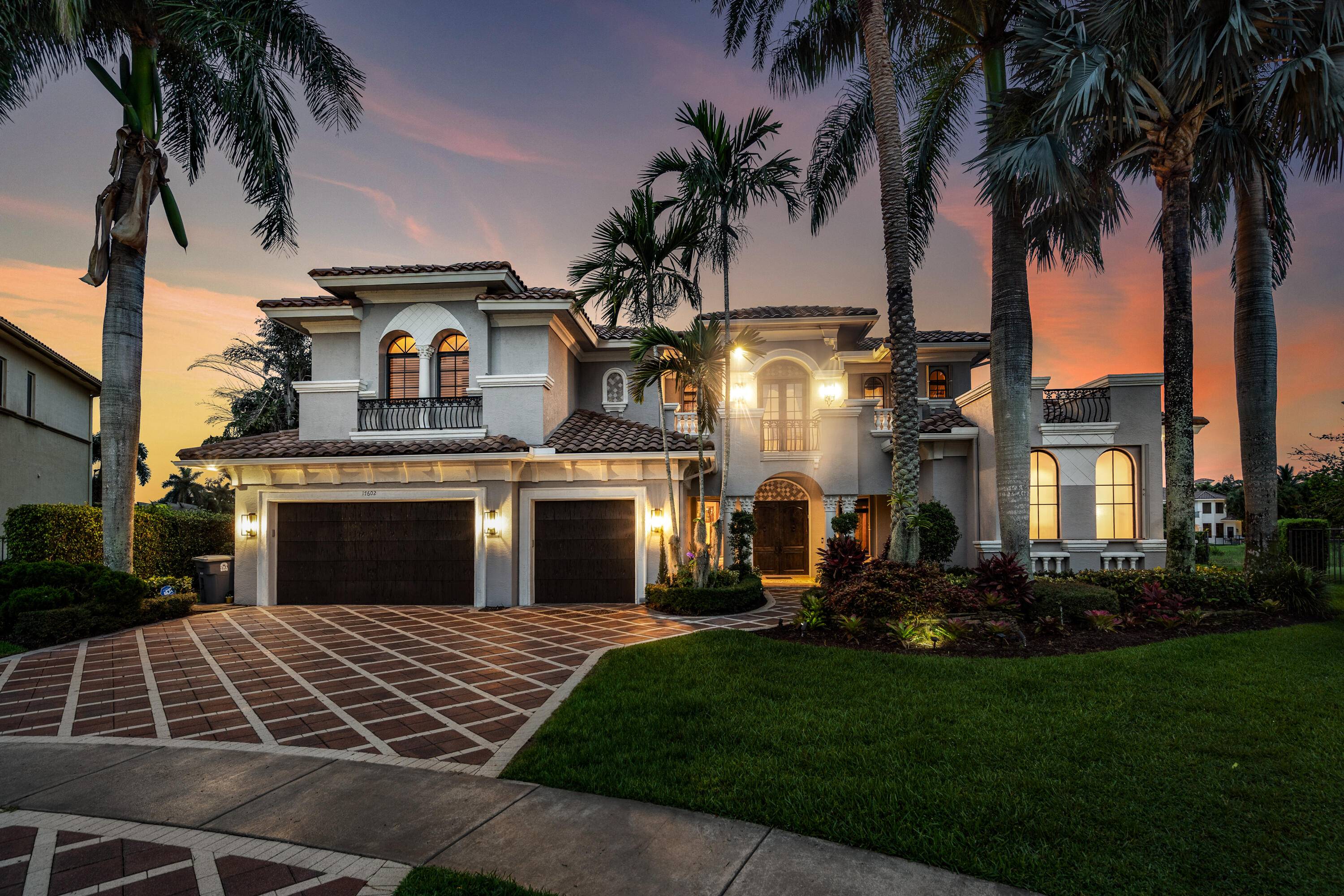 Step into timeless sophistication in this lakefront, custom Bordeaux on one of the best most charming cul de sac lots street in The Oaks !
