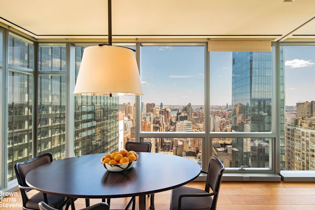 Exceptional Views combined with the impeccable modern aesthetic of Andre Kikoski personifies Apartment 32B at the One Madison Park Condominium.
