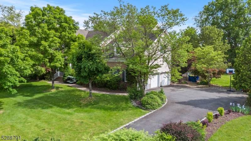 Located in Montgomery Twp, known for its exceptional public schools, this stunning 4 bedroom, 3.