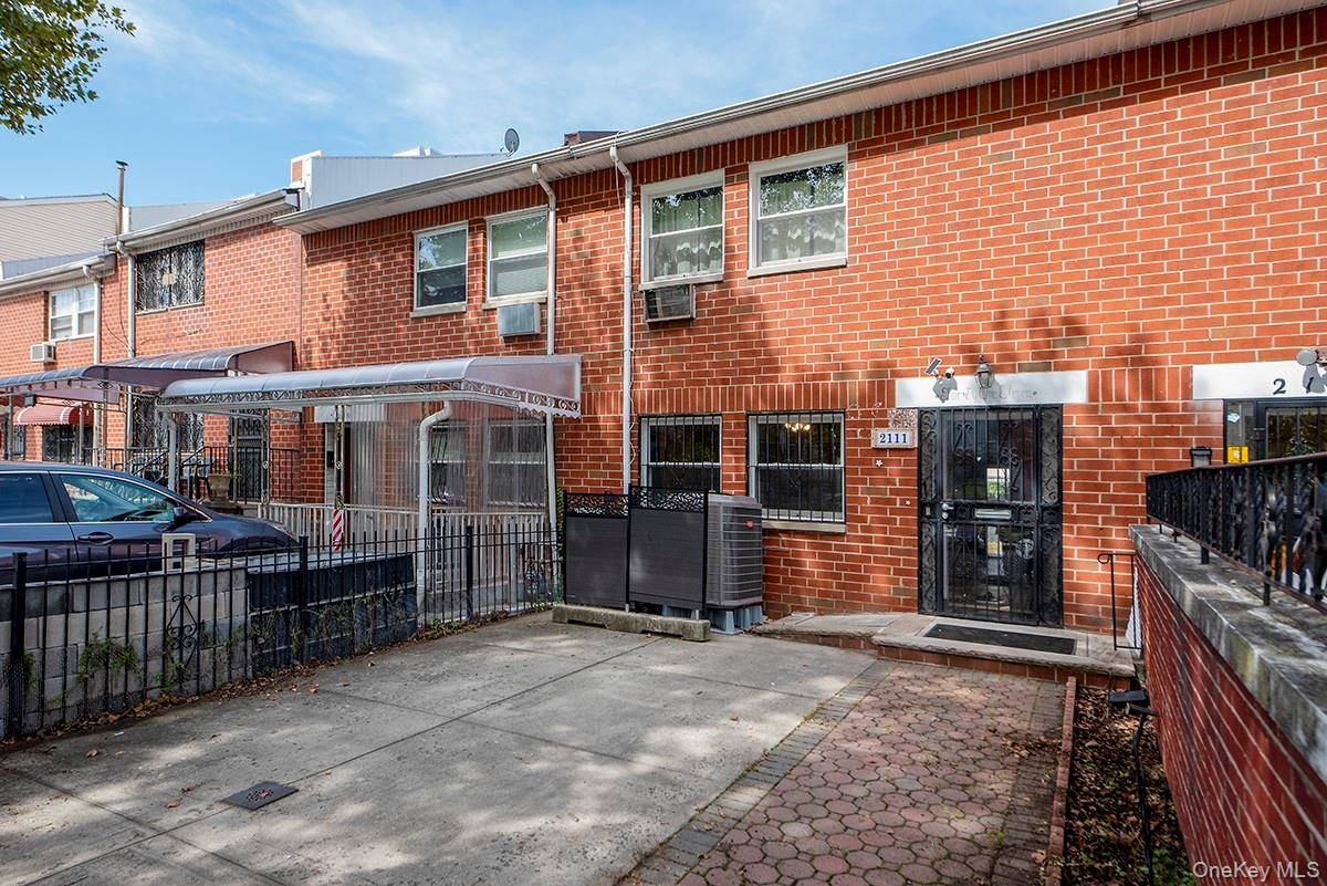 Welcome to this bright and cheerful one family brick row house in the Tremont Section of the Bronx on a beautiful tree lined street that is just across the street ...