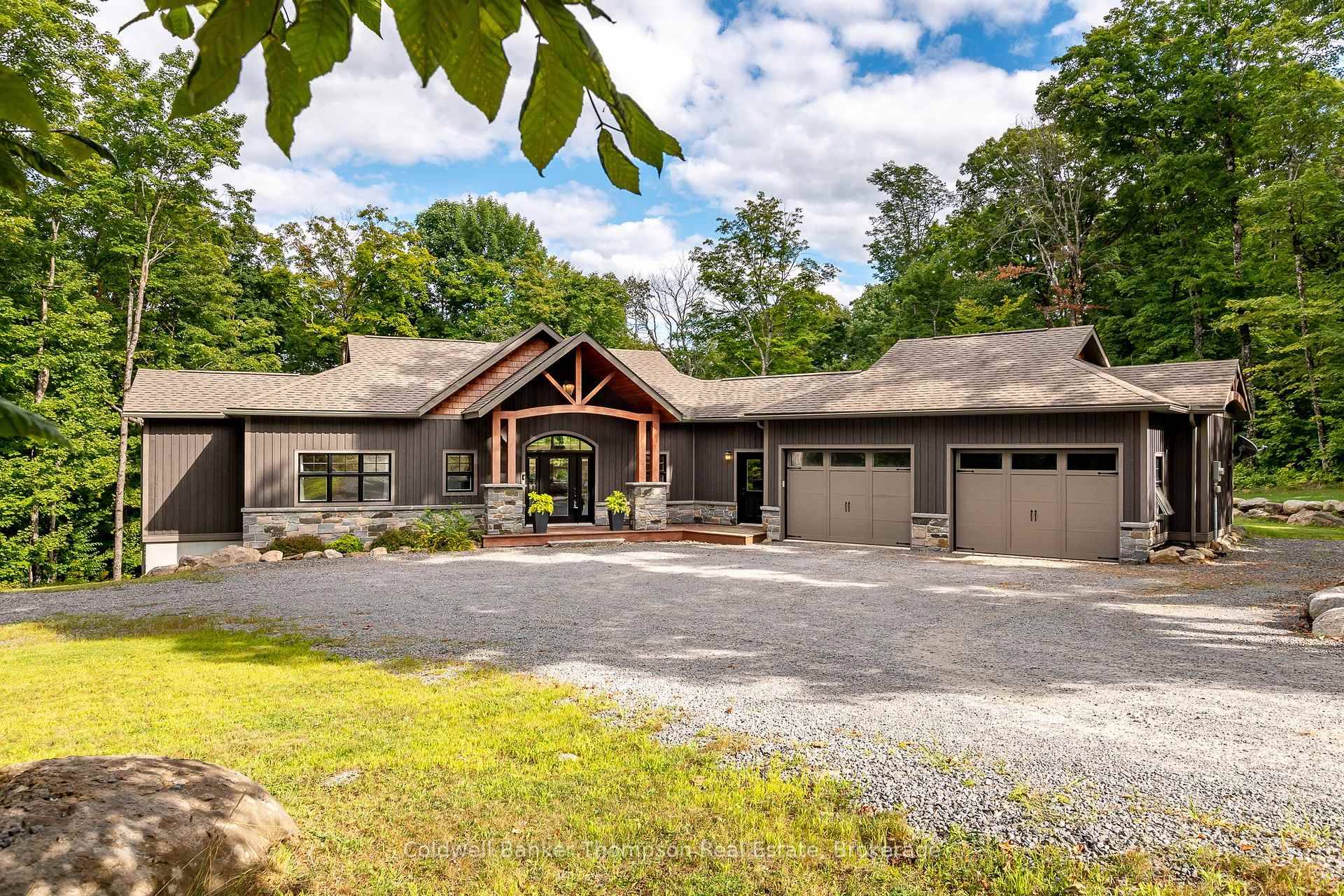 Welcome to this remarkable property, tucked away on a private, year round road.