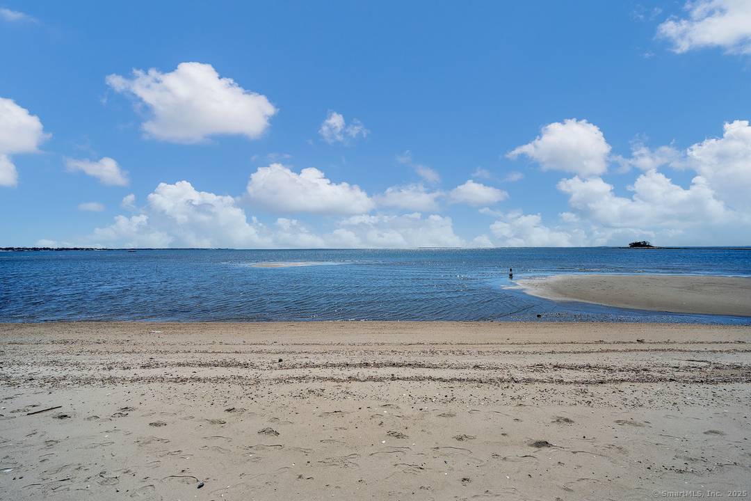 Experience coastal living at its finest in this gorgeous furnished rental located directly on the waterfront, overlooking the serene beauty of Long Island Sound.