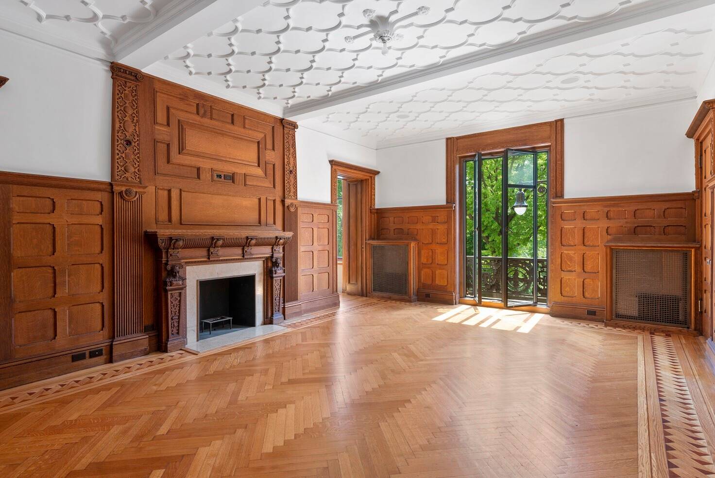 Stunning views into Central Park from the expansive and stunning living room, library, formal dining room, and master bedroom.