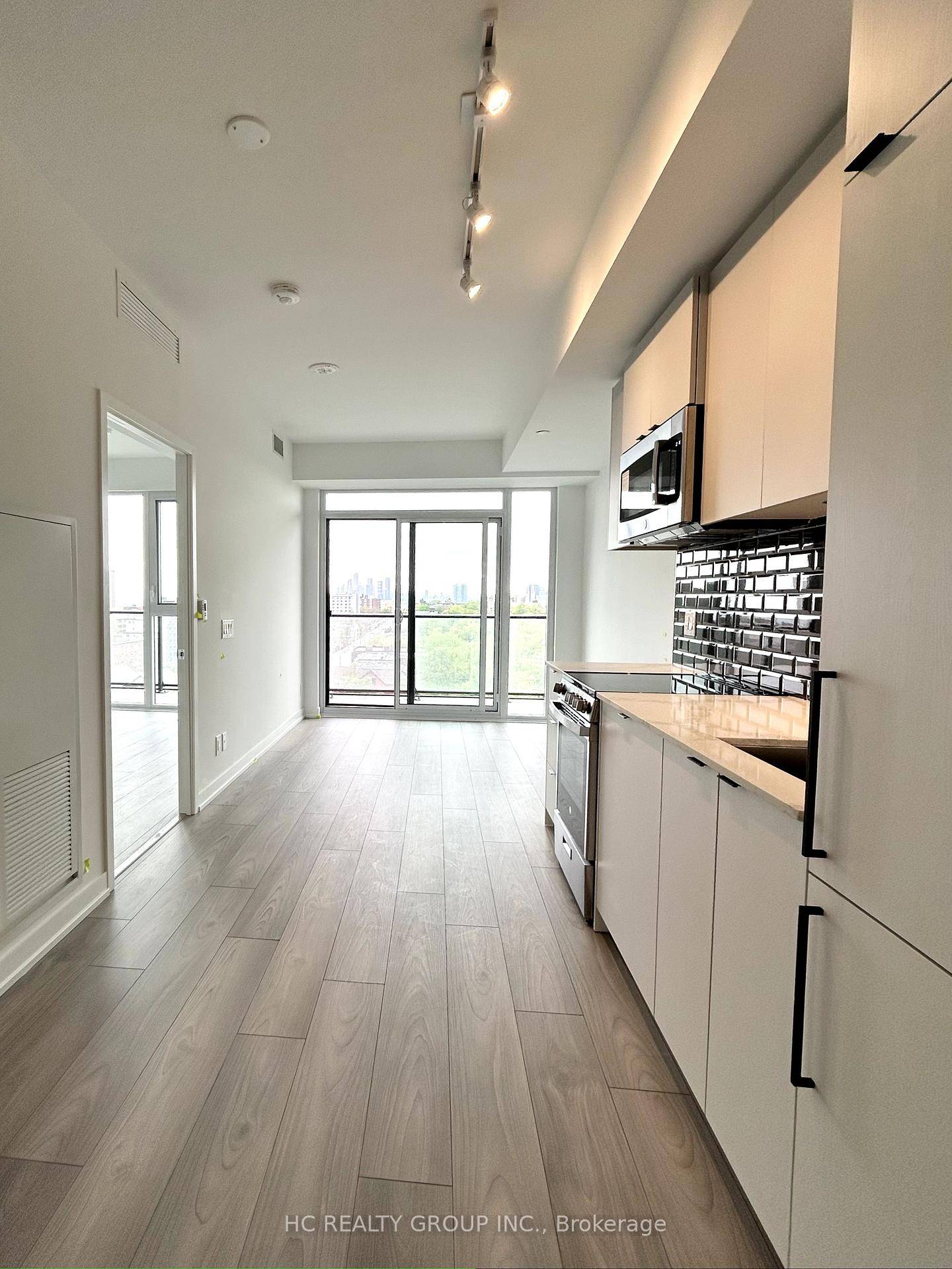 Welcome to this brand new, never lived in 1 Large Den, 1 Bath suite offers a bright and spacious layout featuring floor to ceiling windows, a contemporary kitchen with quartz ...