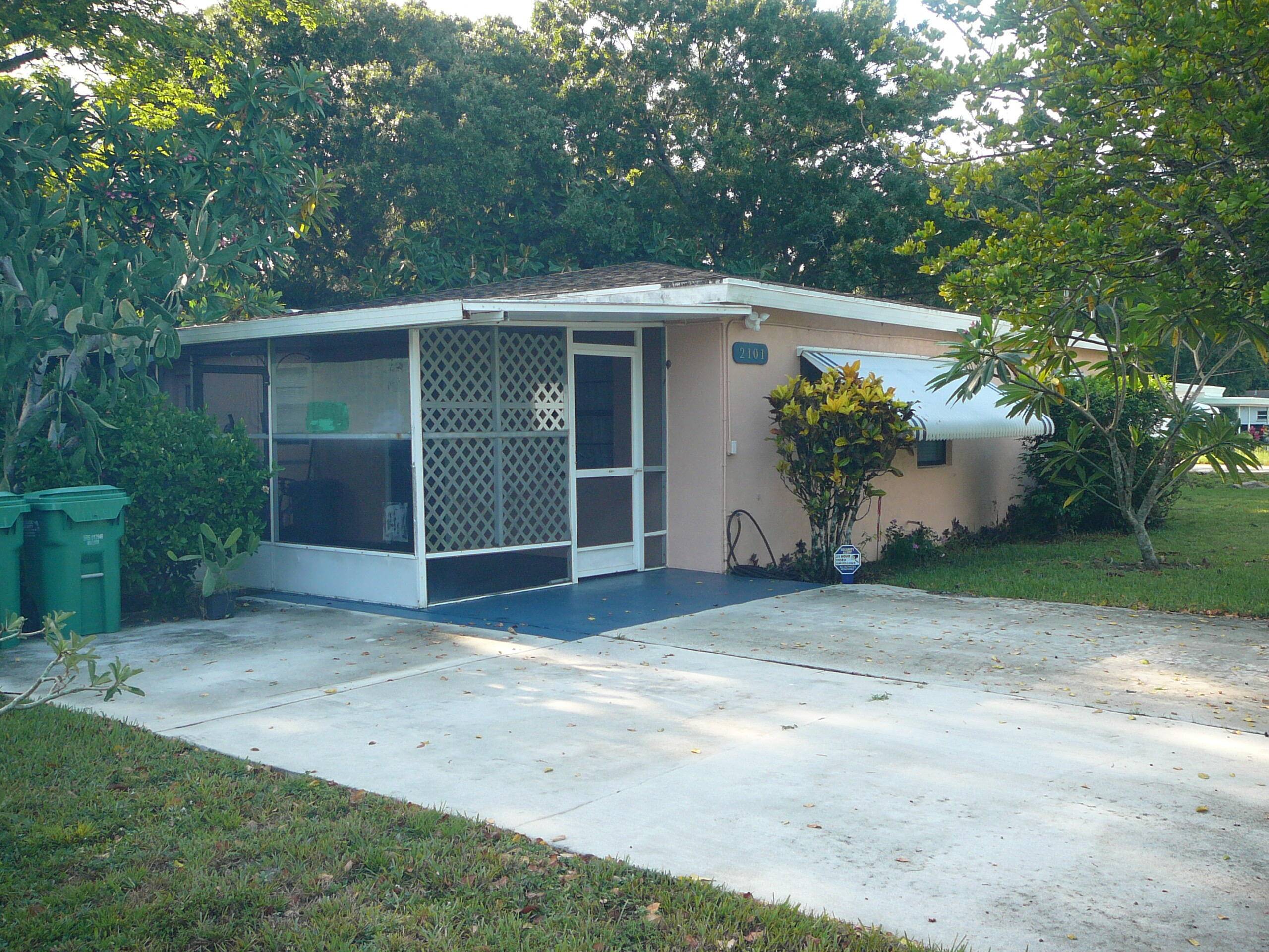 YOU ARE STEPS AWAY FROM FAIRLAWN ELEMENTARY AND INDIAN RIVER STATE COLLEGE WITH THIS SOLID CONRETE BLOCK 3 BEDROOM, 2 BATHROOM HOME.
