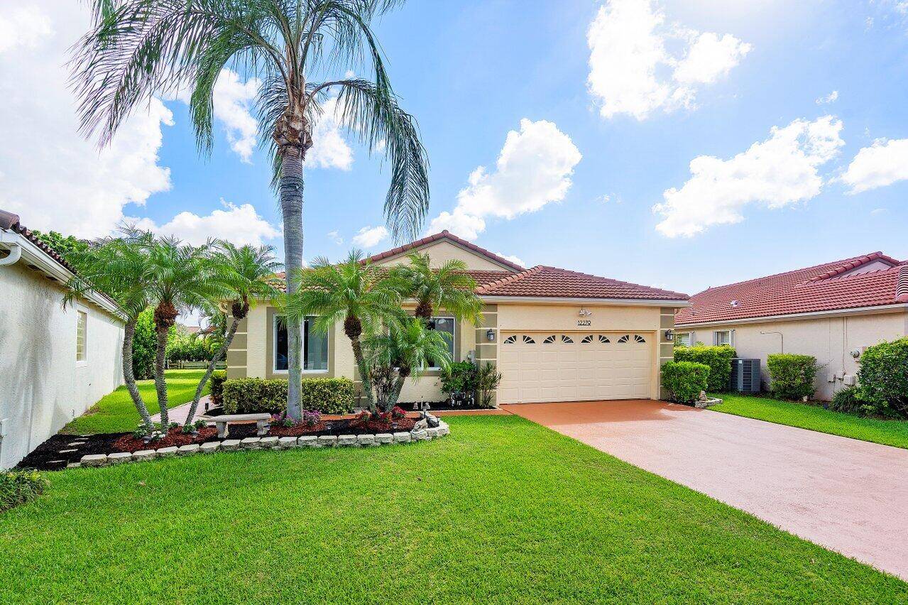 Welcome to this beautiful waterfront retreat tucked away on a quiet cul de sac in one of Boynton Beach's most desirable neighborhoods !