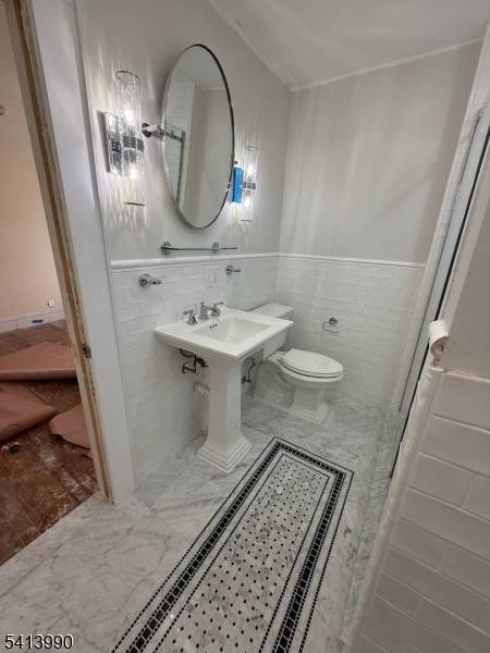 Stunningly remodeled home in highly desired Forest Hills Section of Newark.