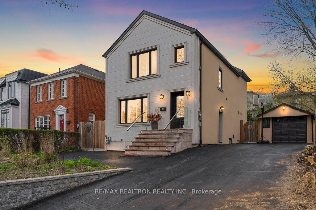 Beautifully designed house, perfectly situated on a DOUBLE LOT 50 by 110 located at 98 Poyntz in the heart of West Lansing.