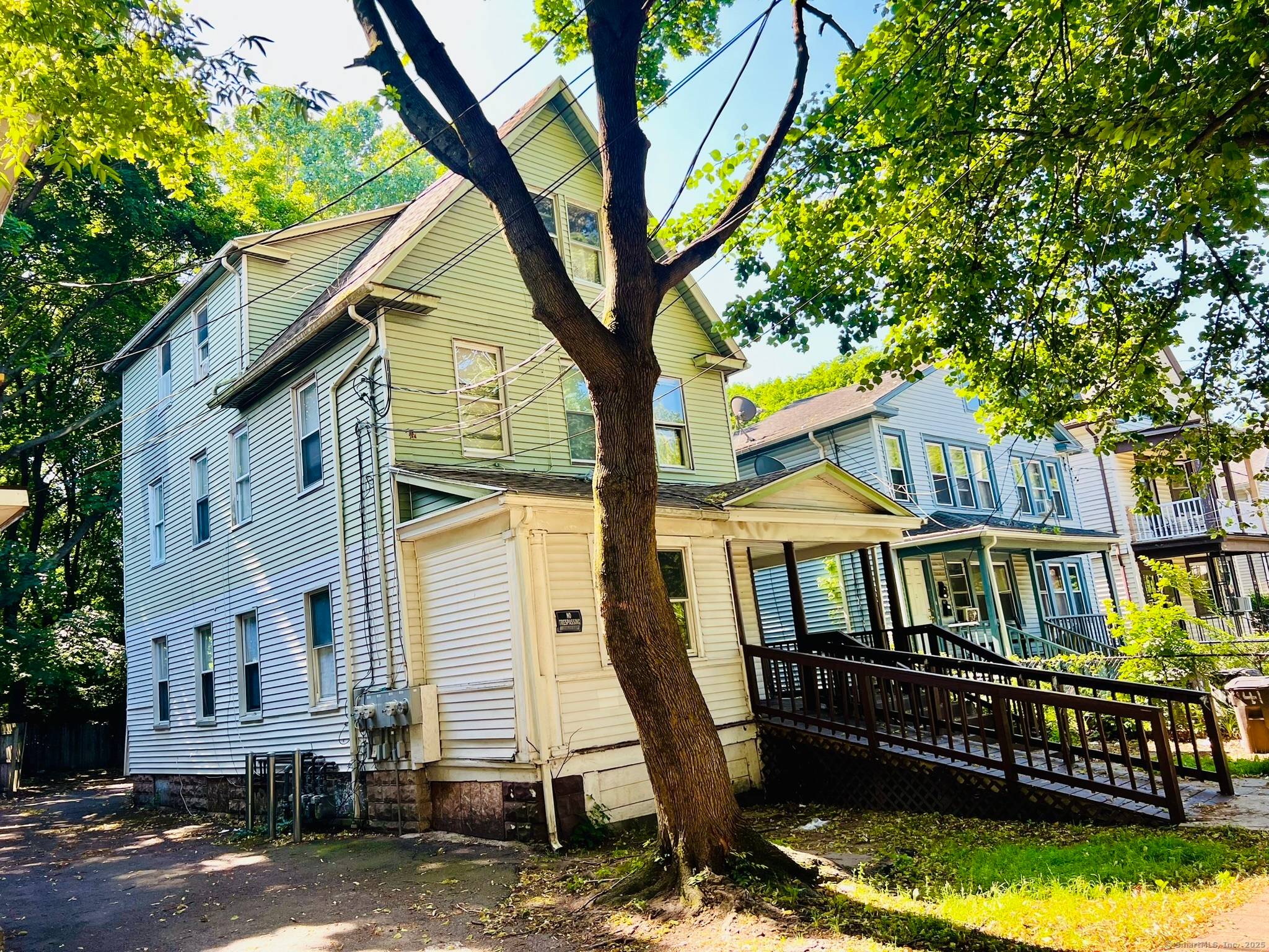Investors, capitalize on this exceptional opportunity to acquire a fully tenanted three unit property, strategically located for commuters.